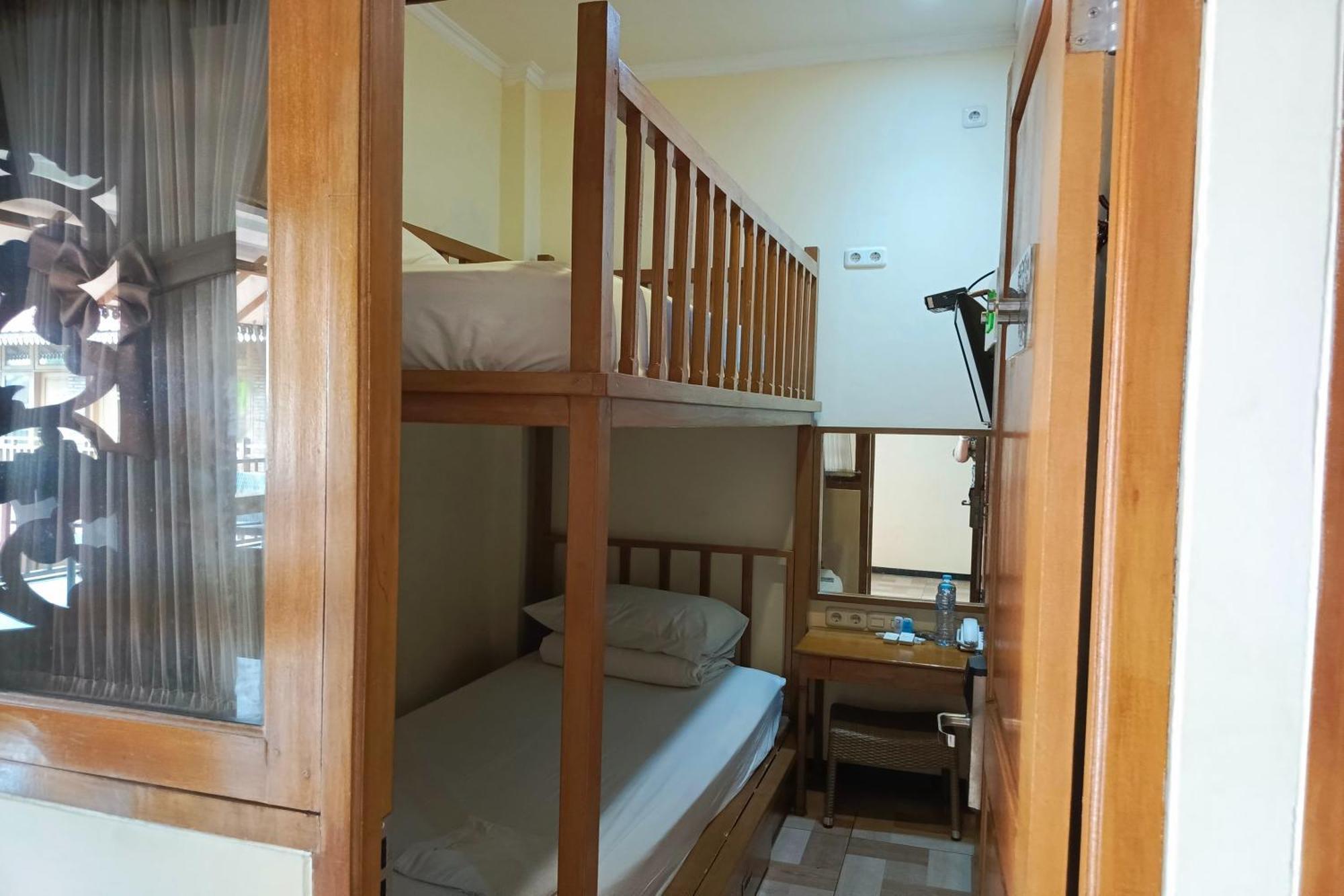 Capsule Tempat Tidur & Sarapan