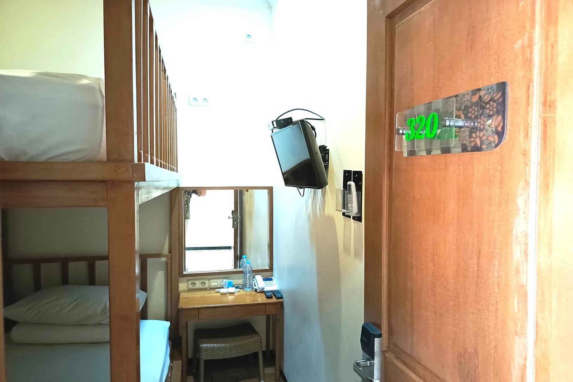 Capsule Tempat Tidur & Sarapan *